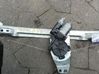 Regulador de puerta delantera con motor 