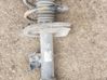 Front shock absorber with coil spring 