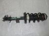 Front shock absorber with coil spring 