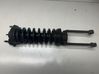 Front shock absorber with coil spring 
