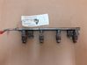 Inyector de combustible MR988977