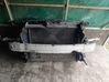 Radiator support slam panel 