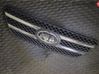 Front bumper lower grill 863501H000