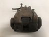Caliper de freno delantero 