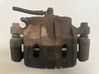 Caliper de freno delantero MR370776