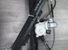 Regulador de ventanilla eléctrico de puerta delantera 7184384
