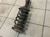 Front shock absorber with coil spring 