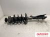 Front shock absorber with coil spring 