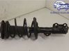 Front shock absorber with coil spring 