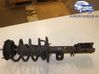 Front shock absorber with coil spring 