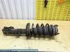 Front shock absorber with coil spring 