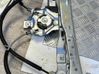 Regulador de puerta delantera con motor 9802740880