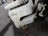 Caliper del freno trasero 00004401N6