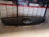 Front bumper upper radiator grill 1454995