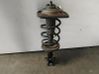 Front shock absorber with coil spring 