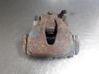 Caliper de freno delantero 