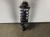 Front shock absorber with coil spring 