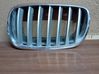 Front bumper upper radiator grill 7171395