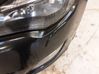 Headlight washer nozzle holder 