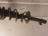 Front shock absorber with coil spring 