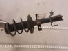 Front shock absorber with coil spring 
