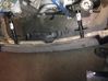 Rear bumper mounting bracket 7055338