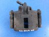Caliper de freno delantero 