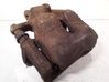 Caliper de freno delantero 5512079J10