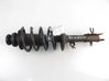 Front shock absorber with coil spring 