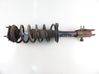 Front shock absorber with coil spring 