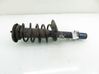Front shock absorber with coil spring 