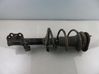 Front shock absorber with coil spring 