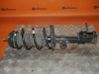 Front shock absorber with coil spring 