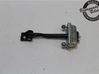 Front door check strap stopper 1641573