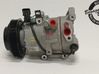 Ilmastointilaitteen kompressorin pumppu (A/C) 97701J9000