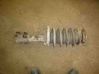Front shock absorber with coil spring 