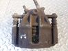 Caliper de freno delantero 7711368117