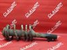 Front shock absorber with coil spring 