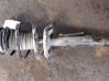 Front shock absorber with coil spring 