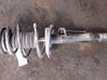 Front shock absorber with coil spring 