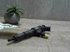 Inyector de combustible 00001980K2