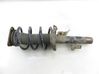 Front shock absorber with coil spring 