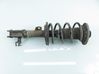 Front shock absorber with coil spring 