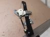 Rear door window regulator with motor 