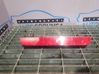 Rear light center trim bar blend 
