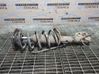 Front shock absorber with coil spring 