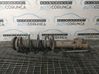 Front shock absorber with coil spring 