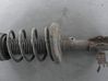Front shock absorber with coil spring 