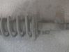 Front shock absorber with coil spring 