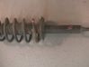 Front shock absorber with coil spring 